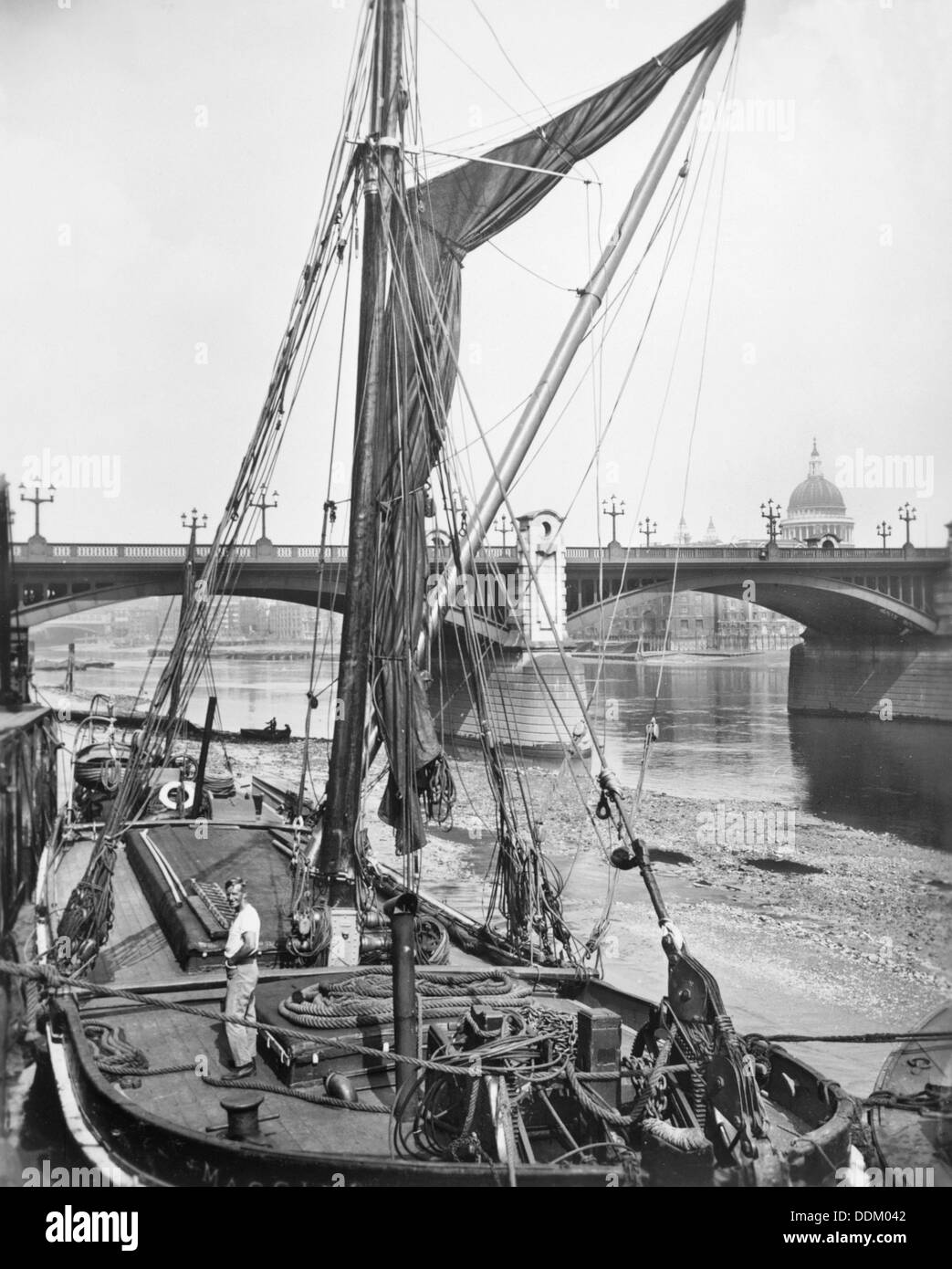 River barge at Southwark Bridge, London. Artist: Unknown Stock Photo
