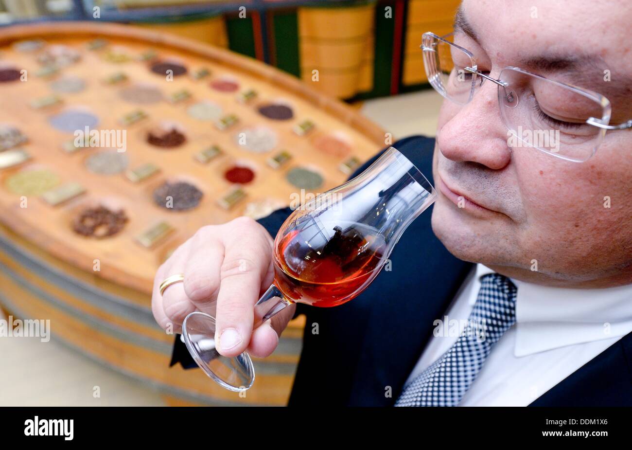 Company spokesman of the Mast-Jaegermeister SE, Paolo Dell Antonio, poses with a sampling glass at the headquarters of the company in Wolfenbuettel, Germany, 03 September 2013. Photo: Peter Steffen Stock Photo