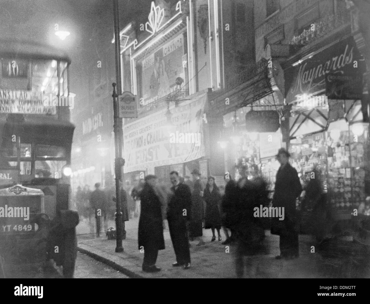 Crowds outside a cinema, London, c1930s. Artist: Unknown Stock Photo