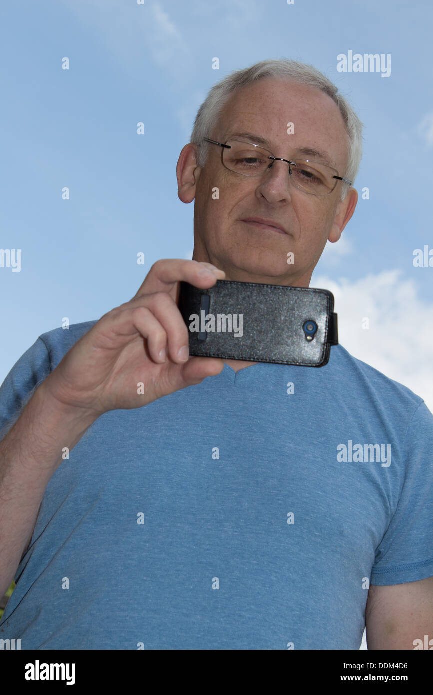 Man using smartphone Stock Photo