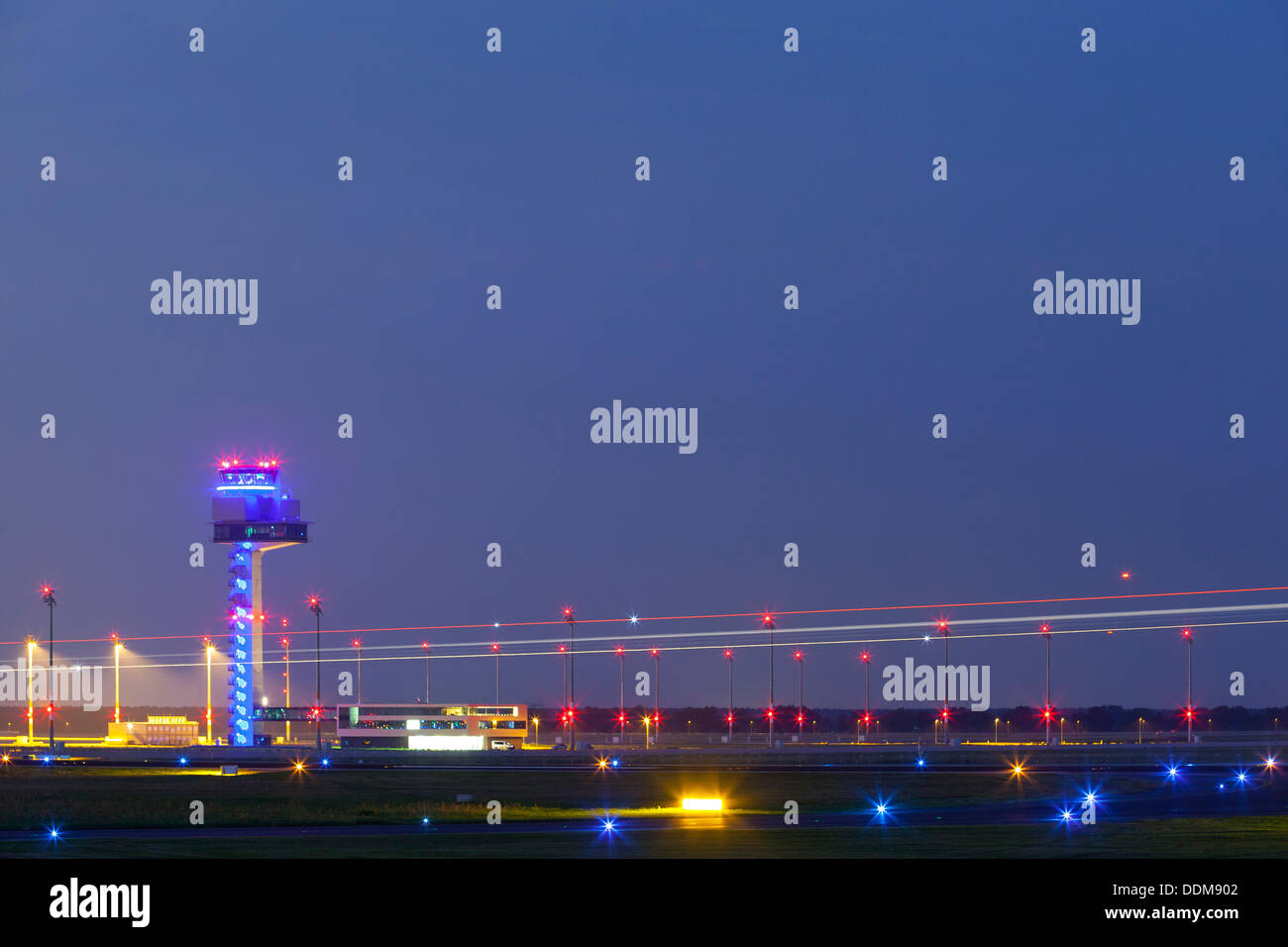 Germany/Brandenburg/Wassmannsdorf, Berlin Brandenburg Airport (BER) with tower seen from Wassmansdorf at night, 22 Aug 2013 Stock Photo