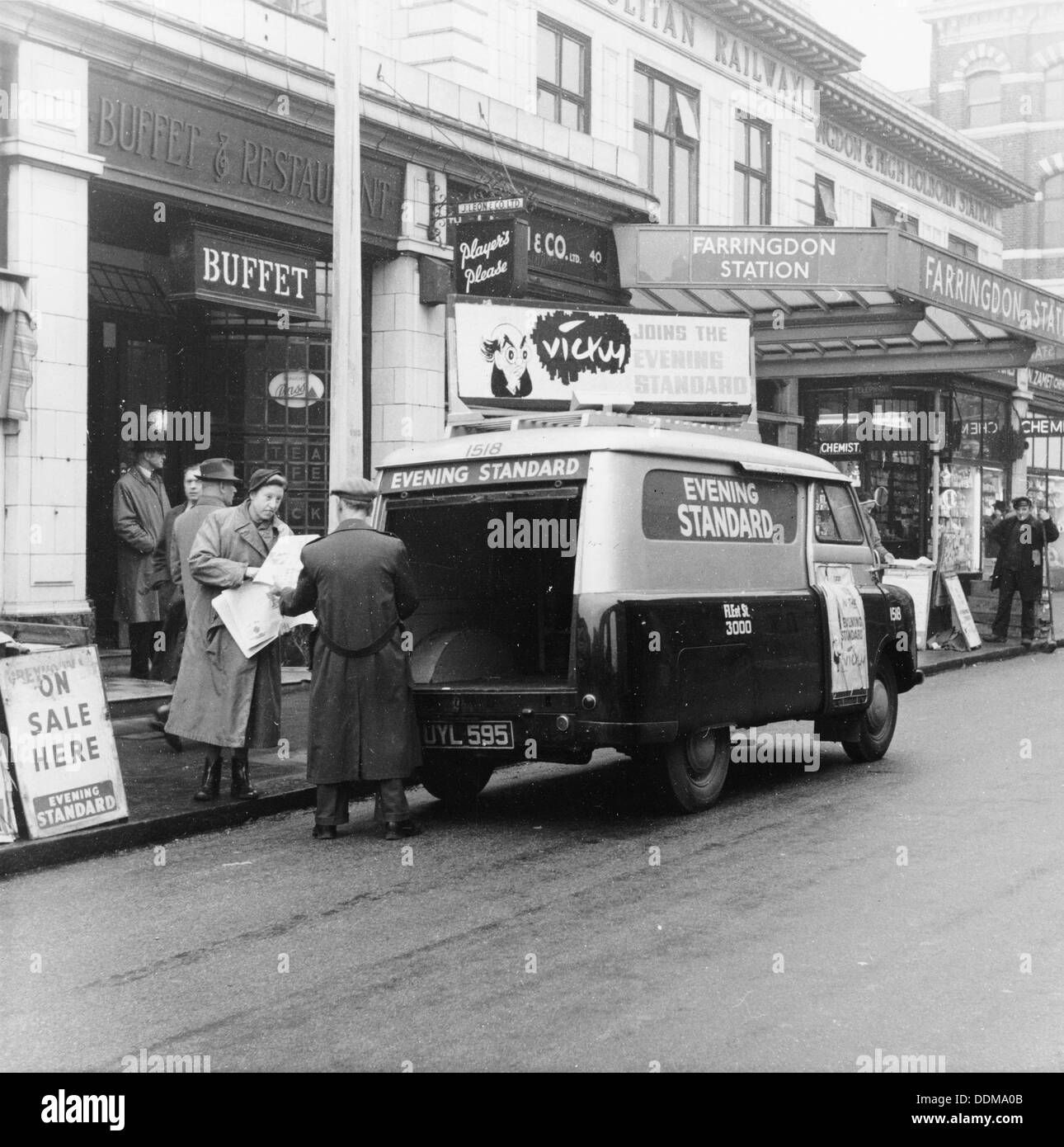 1958 Bedford CA van delivering the Evening Standard, London, 1958. Artist: Unknown Stock Photo