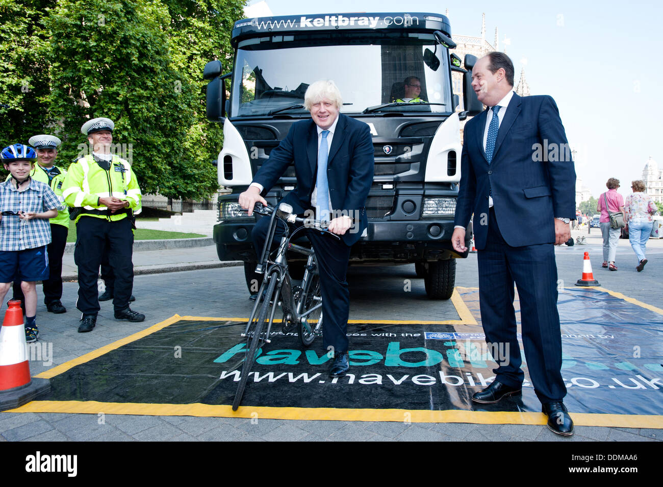 London, UK - 4 September 2013: the Mayor of London Boris Johnson and the Transport Minister Stephen Hammond take part in the Metropolitan Police ‘Exchanging Places’ event, organised to raise awareness of the safety issues faced by lorry drivers and cyclists. Credit:  Piero Cruciatti/Alamy Live News Stock Photo