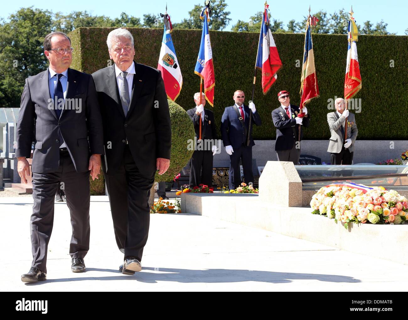 Oradour-sur-Glane, France. 04th Sep, 2013. German President Joachim Gauck (R) and French President Francois Hollande visit the memorial site in Oradour-sur-Glane, France, 04 September 2013. A unit of SS officers murdered 642 citizens of the town in June 1944. The German President is on a three-day visit to France. Photo: WOLFGANG KUMM/dpa/Alamy Live News Stock Photo