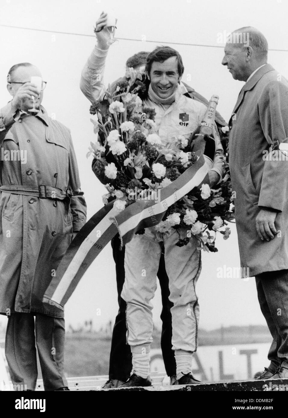 Jackie Stewart, celebrating victory at The Dutch Grand Prix, Zandvoort, 1968. Artist: Unknown Stock Photo