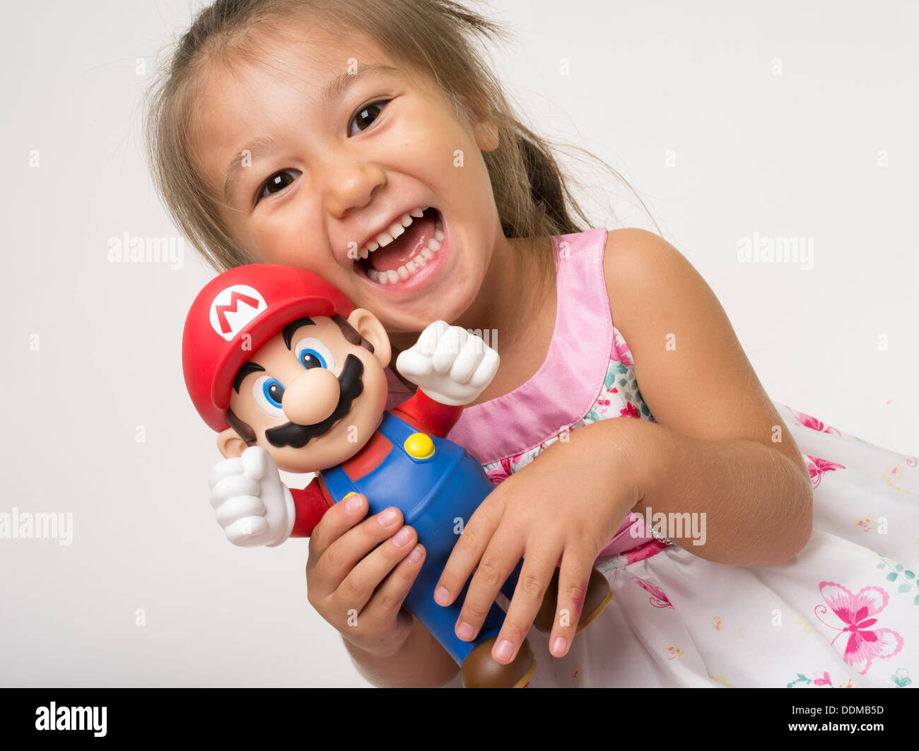 Nintendo Super Mario Toy with Japanese girl Stock Photo