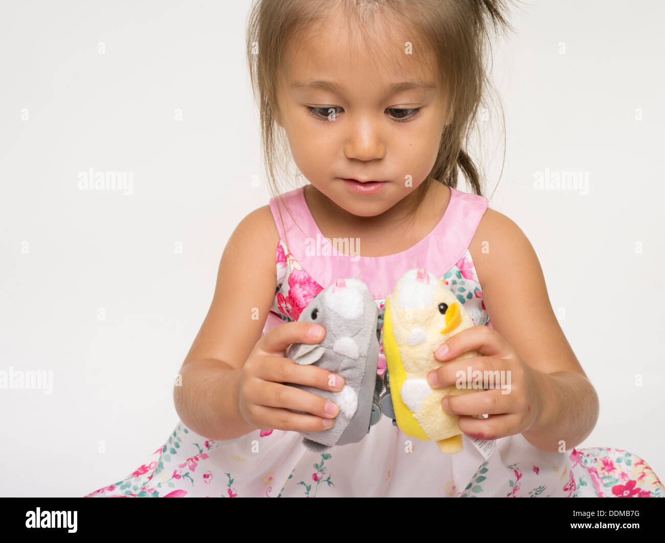 Young girl with Zhu Zhu Go Pets Hamsters toy Stock Photo