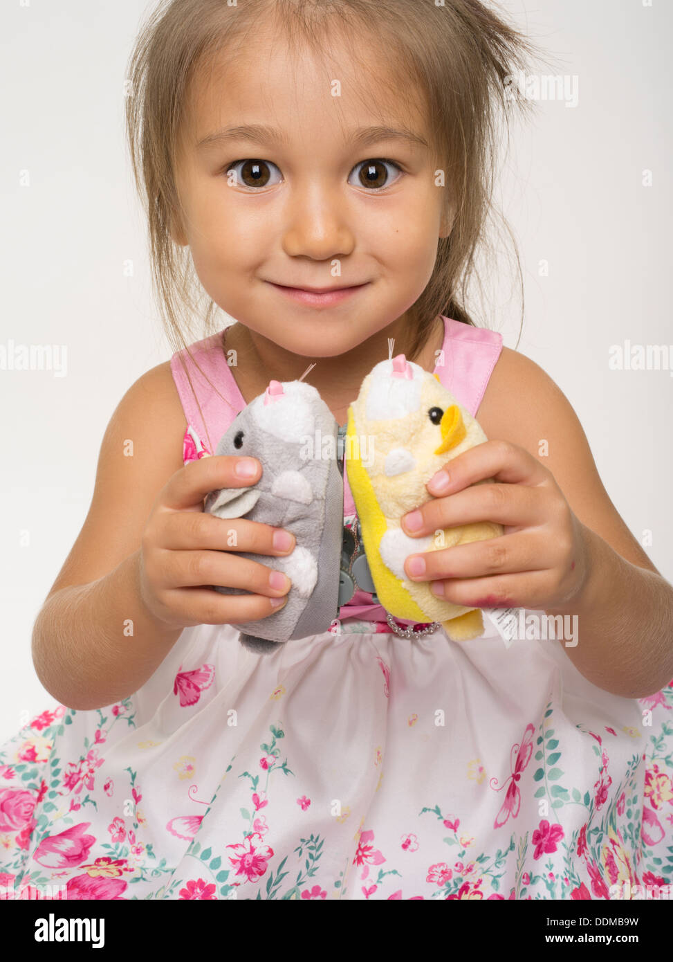 Young girl with Zhu Zhu Go Pets Hamsters Stock Photo