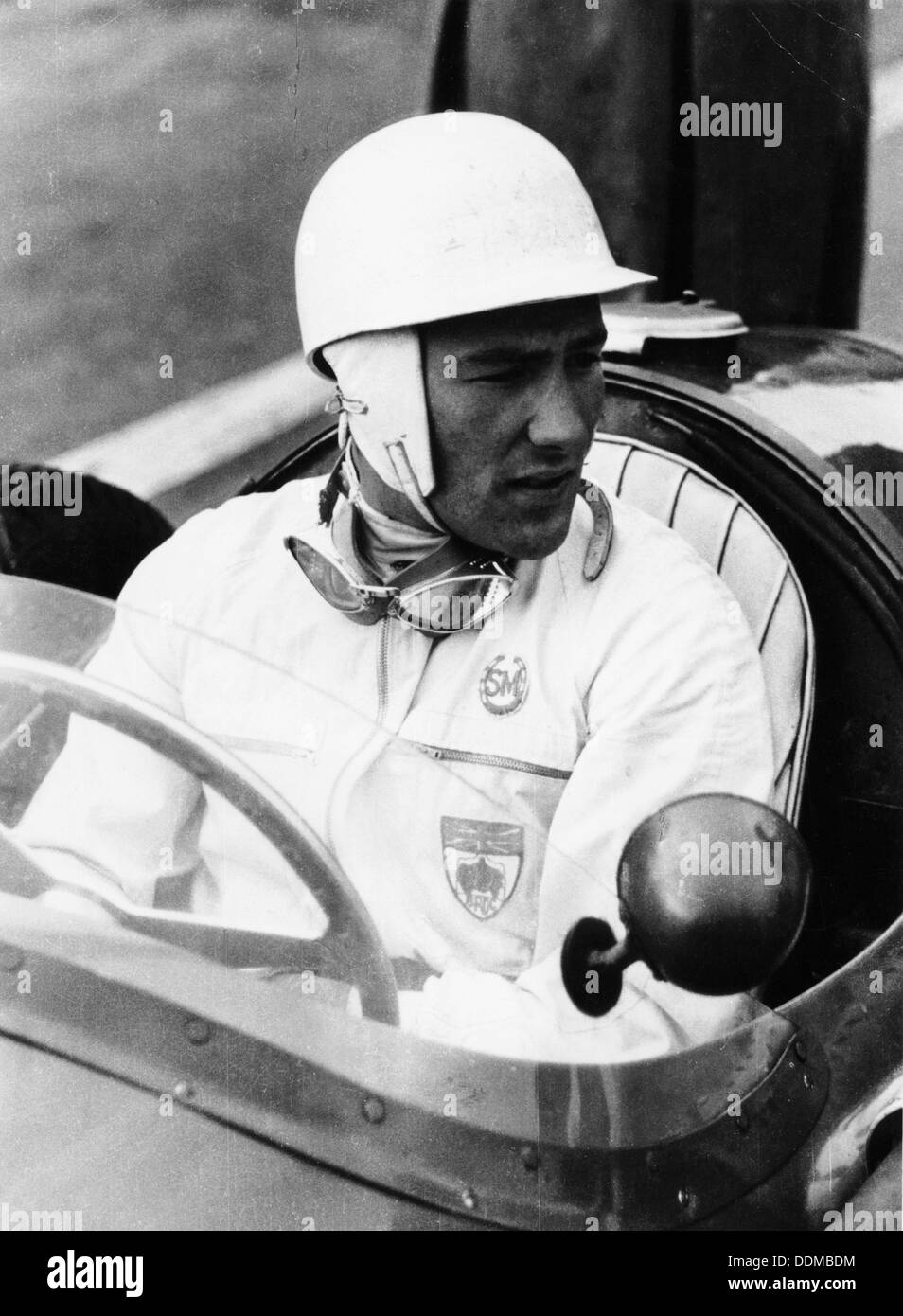 Stirling Moss at Goodwood, 1954. Artist: Unknown Stock Photo