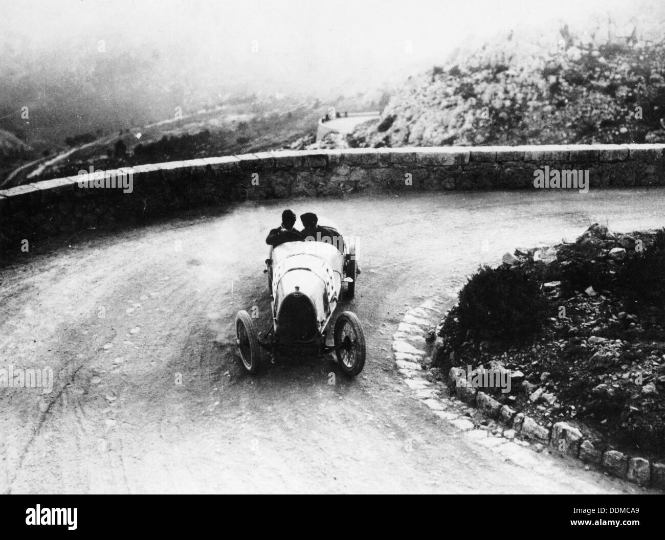 Louis Chiron driving a Bugatti at a hill climb, 1923. Artist: Unknown Stock Photo