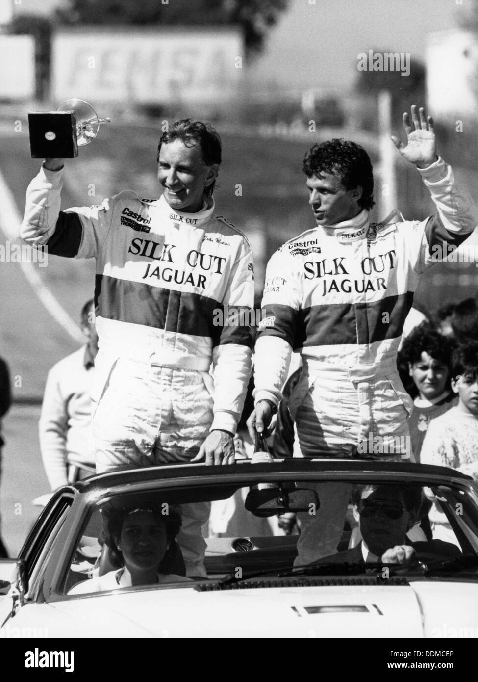 John Watson and Jan Lammers waving at the crowds at Jarama, Spain, 1987. Artist: Unknown Stock Photo