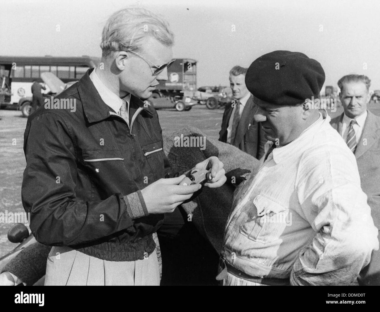 Mike Hawthorn with a model car, c1953-c1958. Artist: Unknown Stock Photo