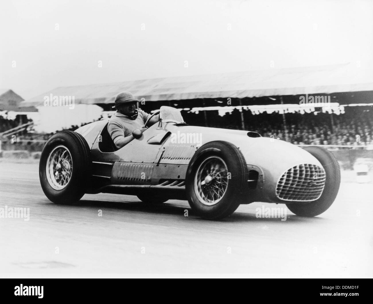 Froilan Gonzalez driving a Ferrari, early 1950s. Artist: Unknown Stock Photo