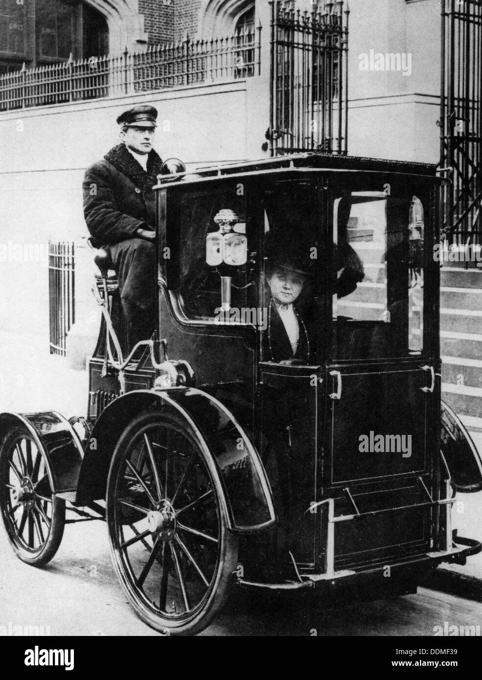 Woman passenger in a 1910 taxi cab, New York, USA, (c1910?). Artist: Unknown Stock Photo