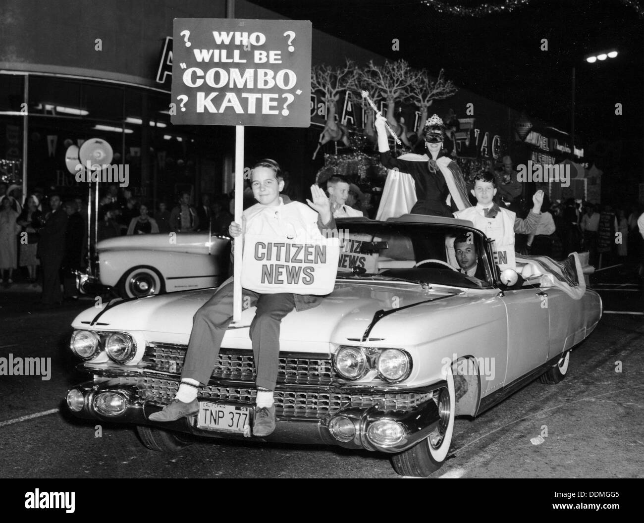 Fancy dress parade with a 1957 Cadillac, USA, (c1957?). Artist: Unknown Stock Photo