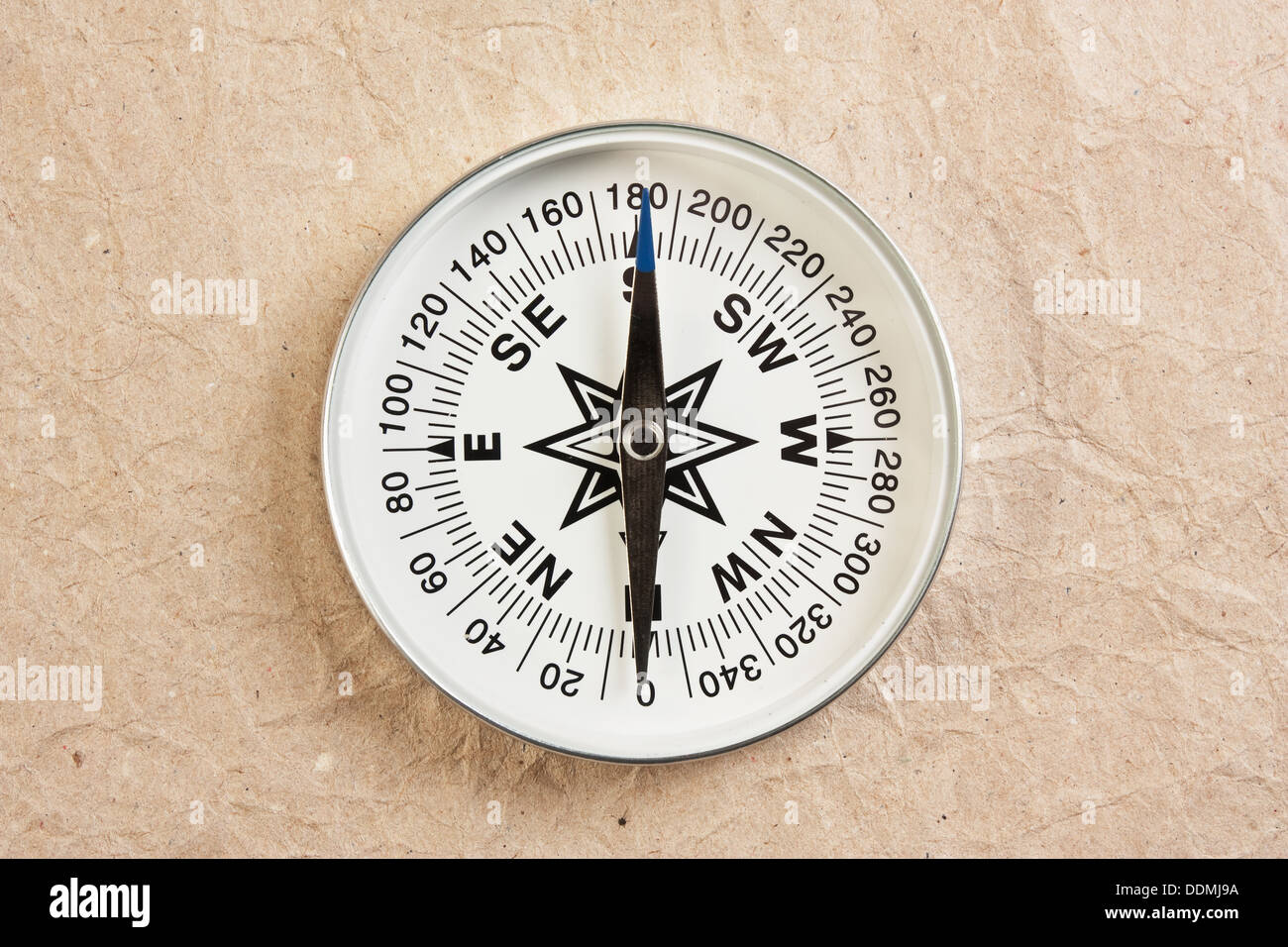 compass on the background of old paper Stock Photo - Alamy