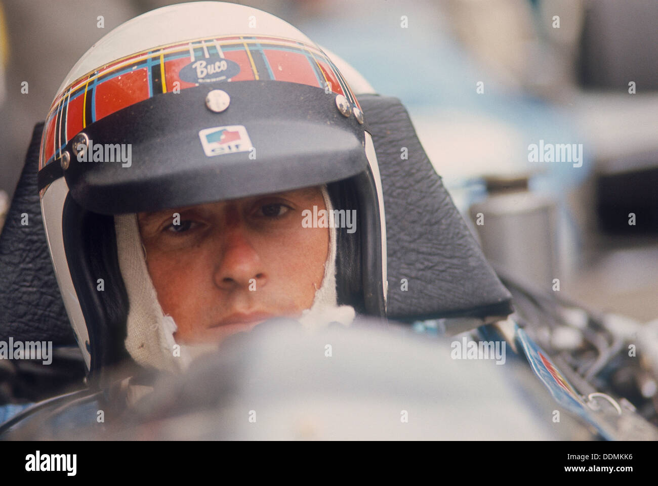 Jackie Stewart at the wheel of a racing car. Artist: Unknown Stock Photo