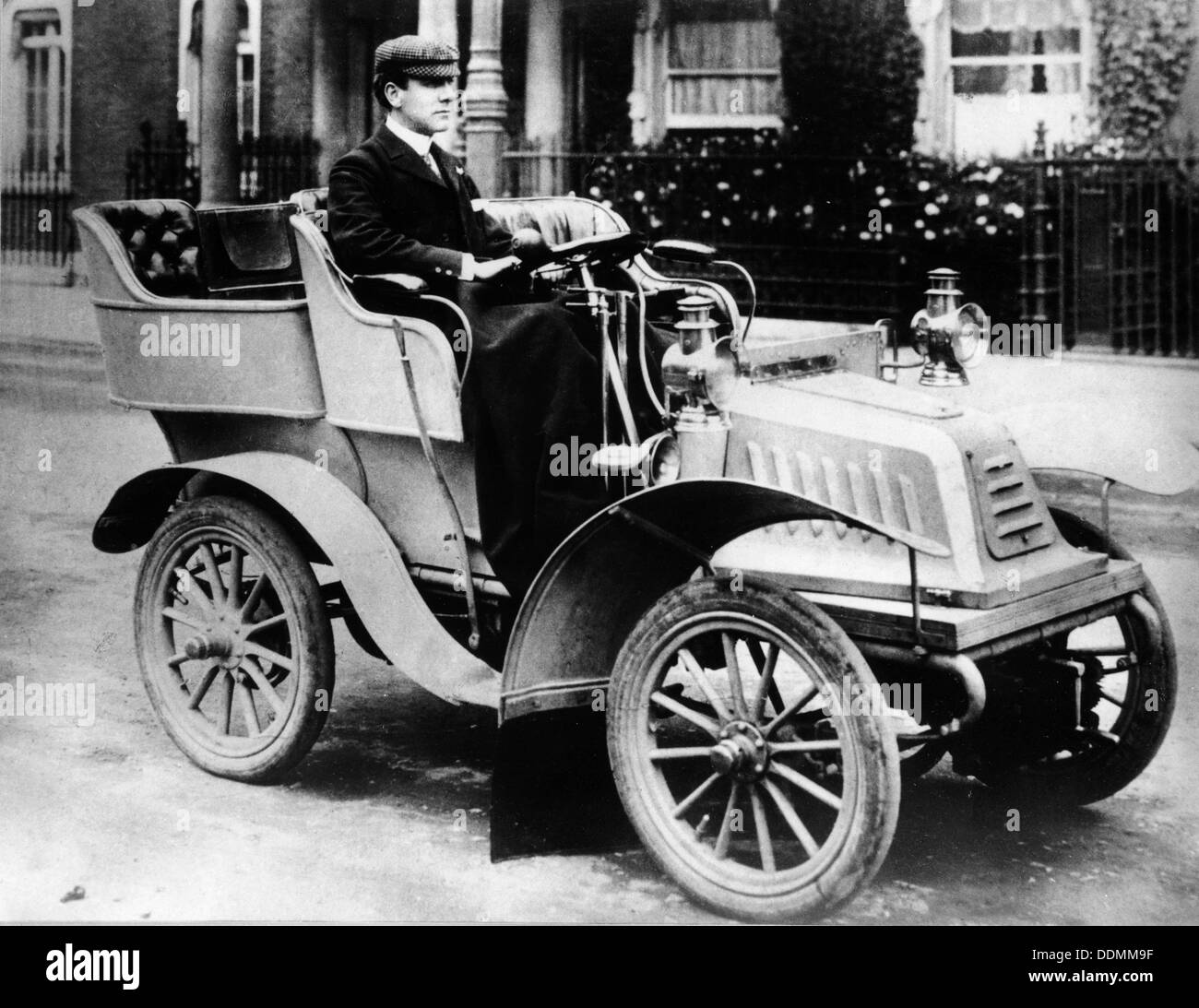 A man driving an 8hp De Dion Bouton, 1902. Artist: Unknown Stock Photo