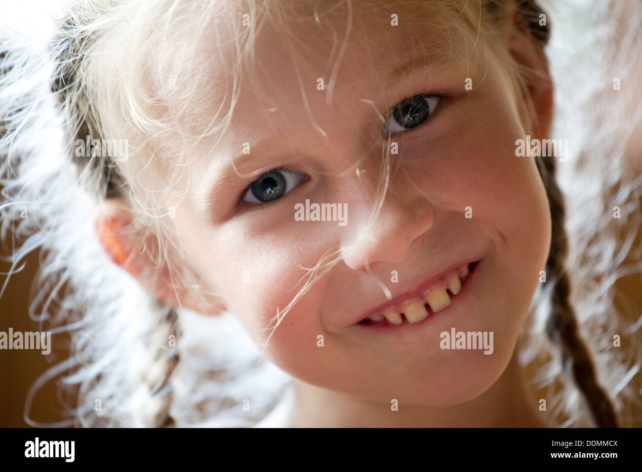 closeup portrait of funny smiling little girl Stock Photo Alamy