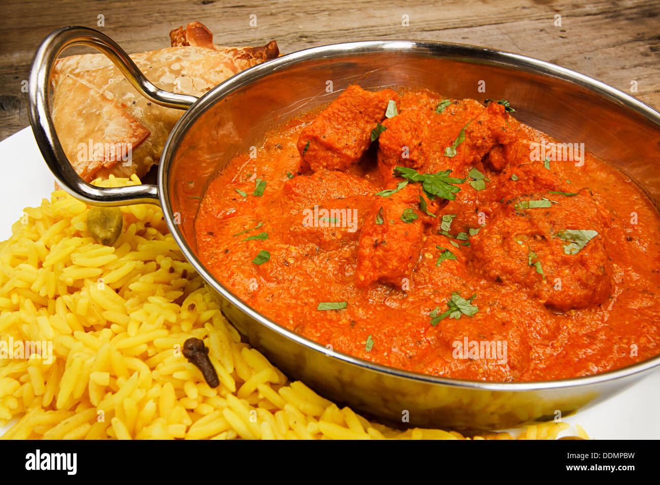 Chicken Tikka masala a popular indian curry developed in Europe as a fusion of Eastern food and modern western tastes Stock Photo