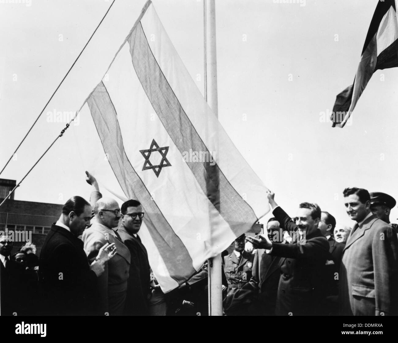 Abba Eban (1915-2002), at the raising of the Israeli flag at UN, 1949. Artist: Unknown Stock Photo