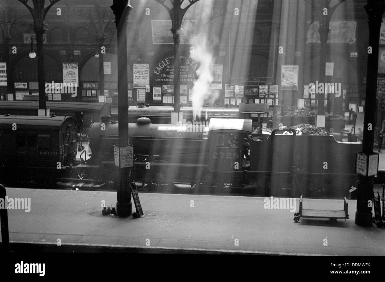 Steam locomotives wait at Liverpool Street Station, London. Artist: Unknown Stock Photo