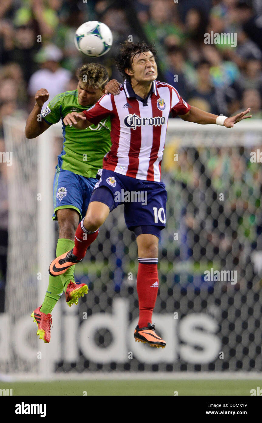 Seattle, Washington, USA. 04th Sep, 2013. Seattle Sounders FC defender DeAndre Yedlin #17 and Chivas USA midfielder Miller Bolanos #10 battle for a header at CenturyLink Field in Seattle, WA. Seattle Sounders FC defeats Chivas USA 1 - 0 .George Holland / Cal Sport Media. Credit:  Cal Sport Media/Alamy Live News Stock Photo