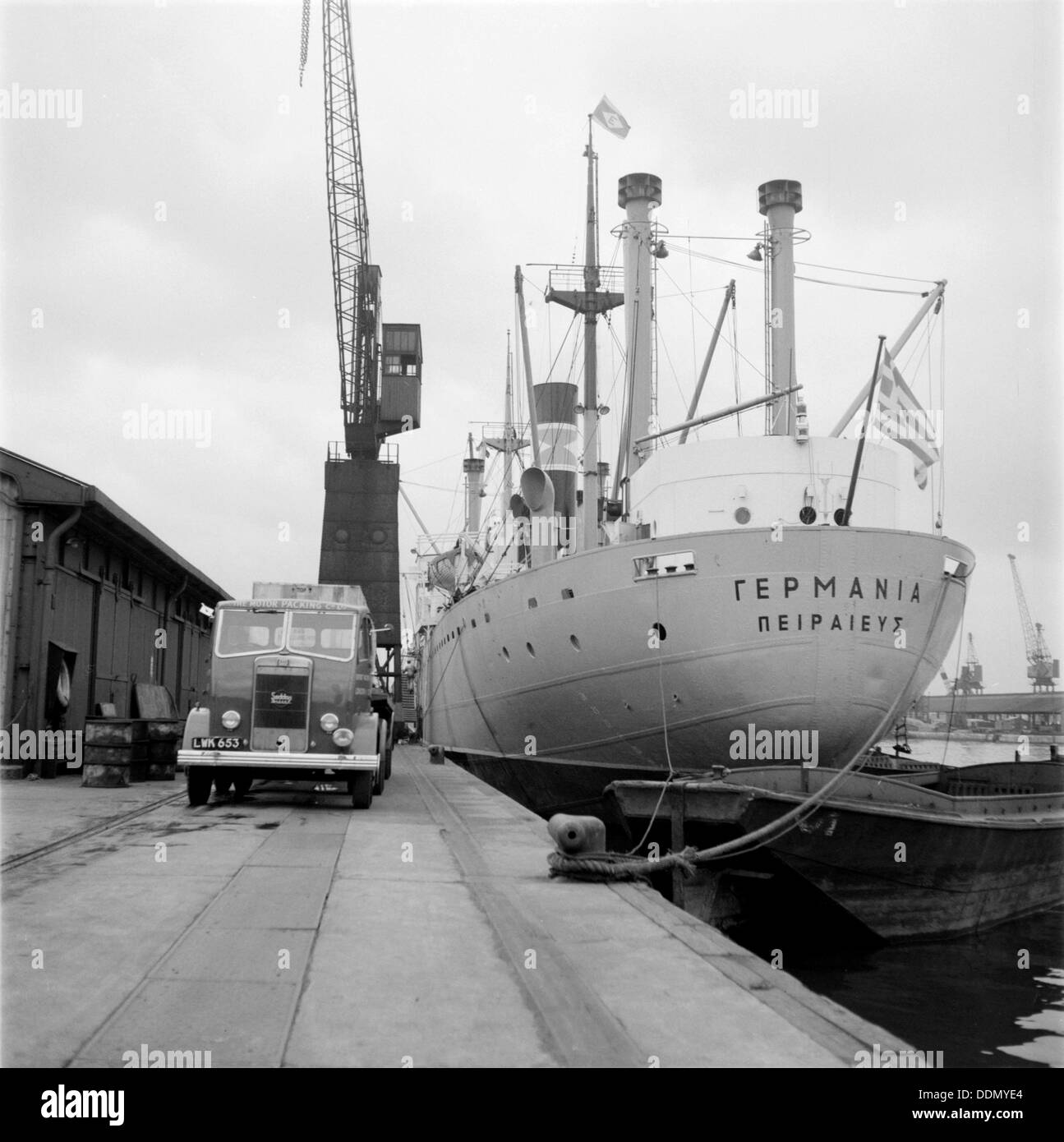 A ship unloading in West India Docks, London, c1945-c1965. Artist: SW Rawlings Stock Photo