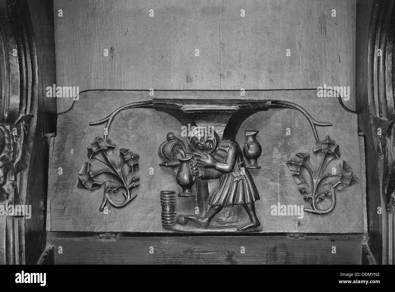 'The Tapster', a misericord in St Laurence's church, Ludlow, Shropshire, 1966. Artist: Laurence Goldman Stock Photo