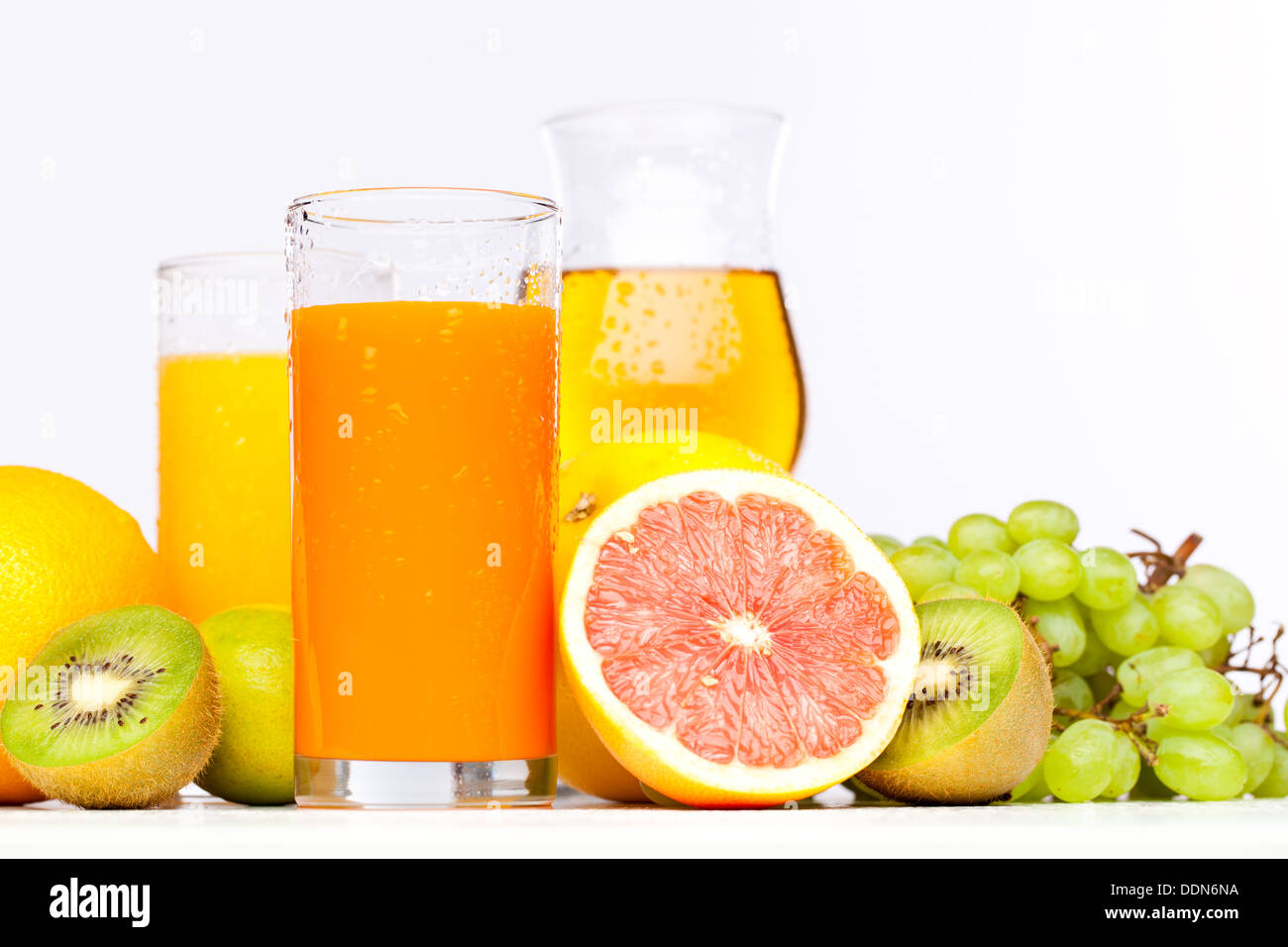 Fresh citrus juices isolated on white background Stock Photo Alamy