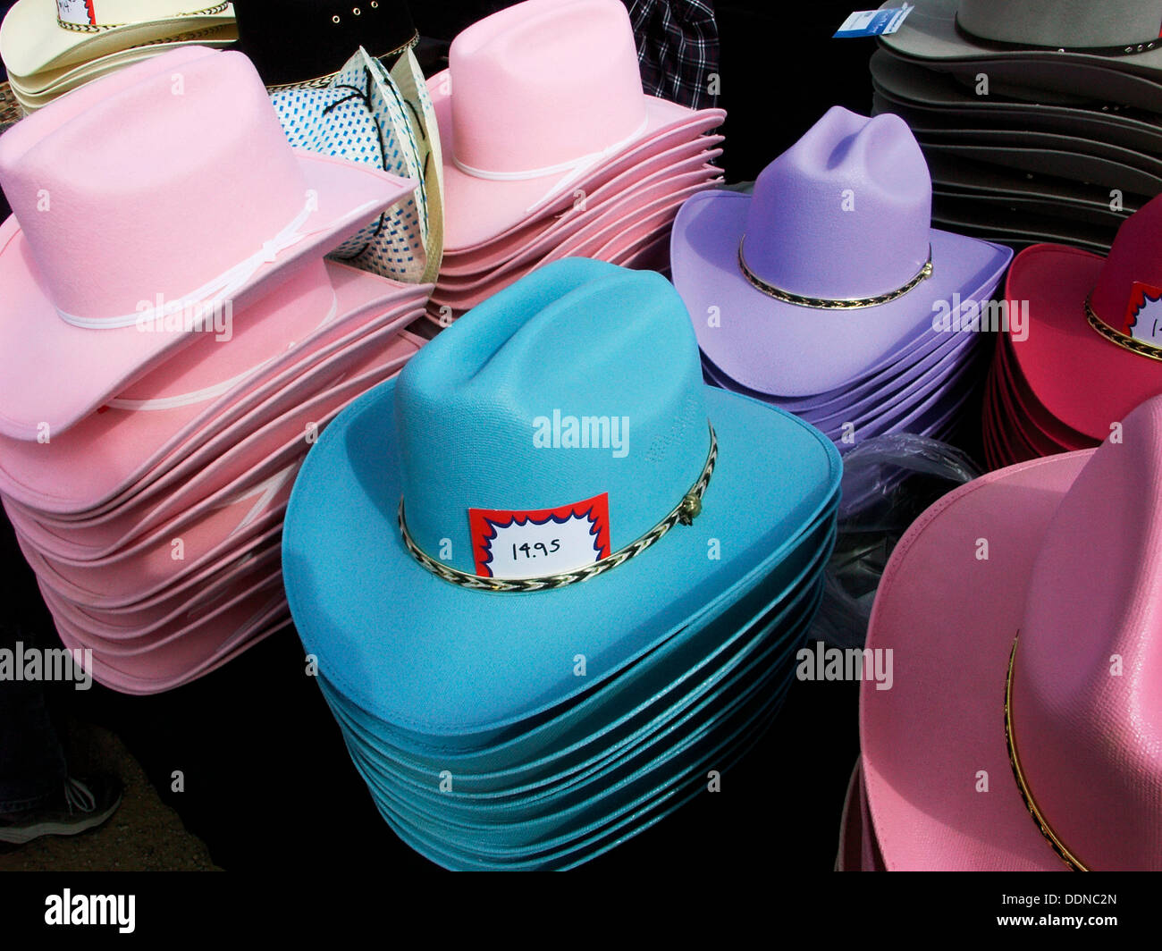 Colored cowboy hats for kids and especially for young girls Stock Photo