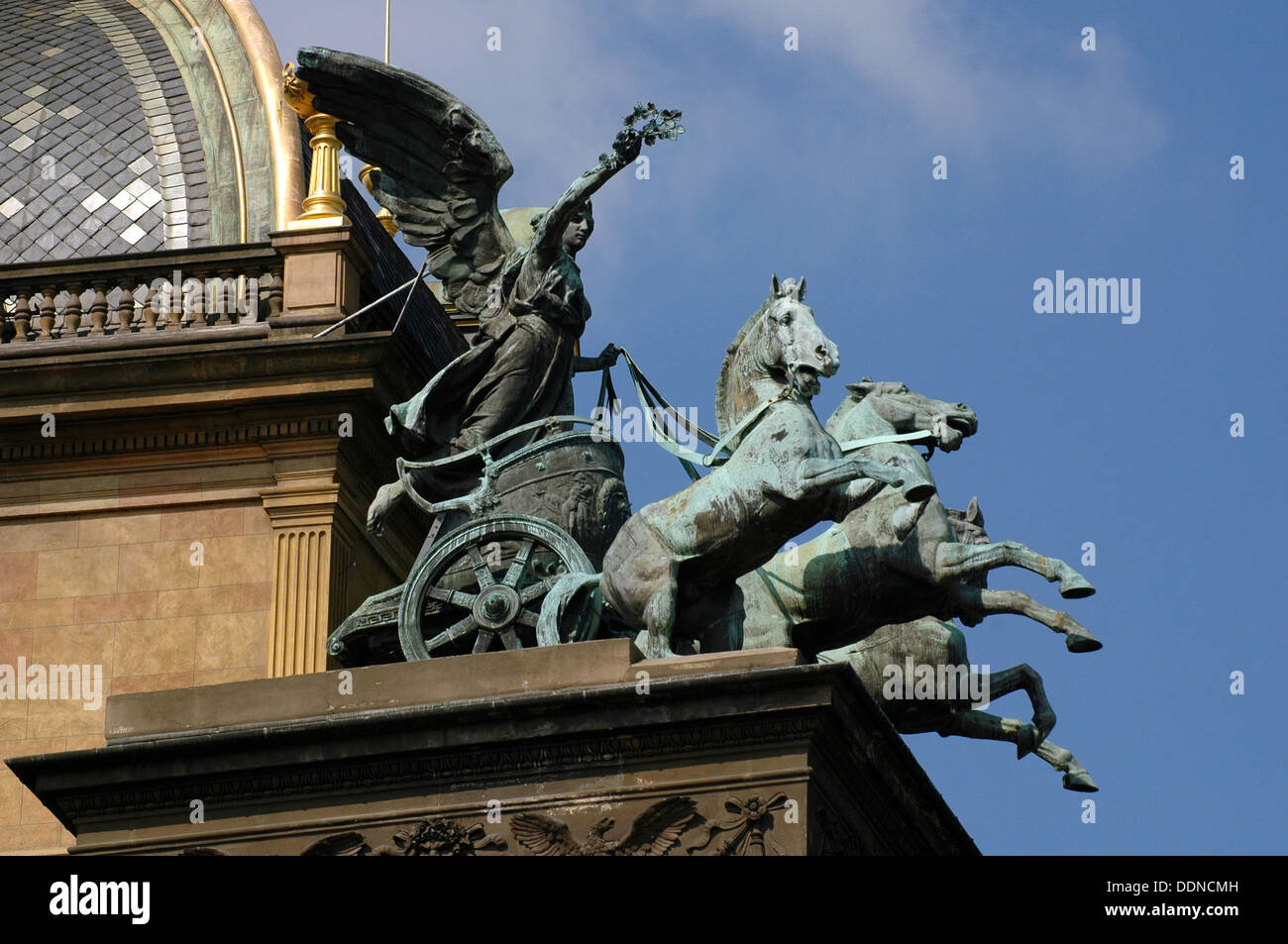 Sculpture of A triga three-horse chariot stands AT the rooftop of the National Theatre Narodni Divadlo in Nove Mesto district Prague Czech Stock Photo