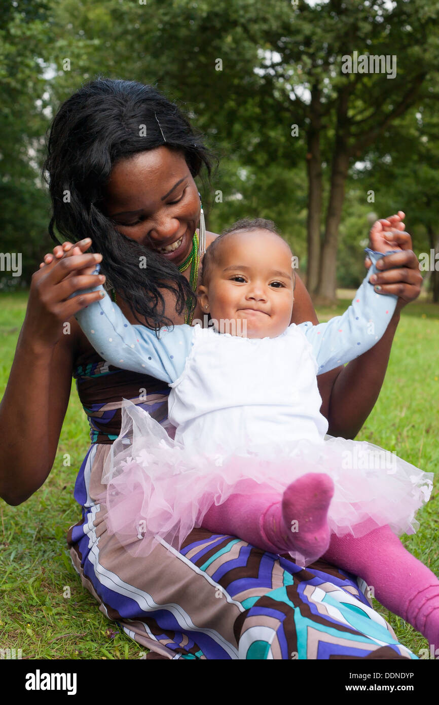 Happy mixed family is having a nice day in the park Stock Photo Alamy