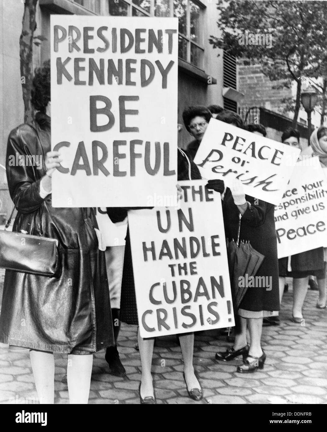 Women Strike for Peace holding placards relating to the Cuban missile crisis and to peace Stock Photo