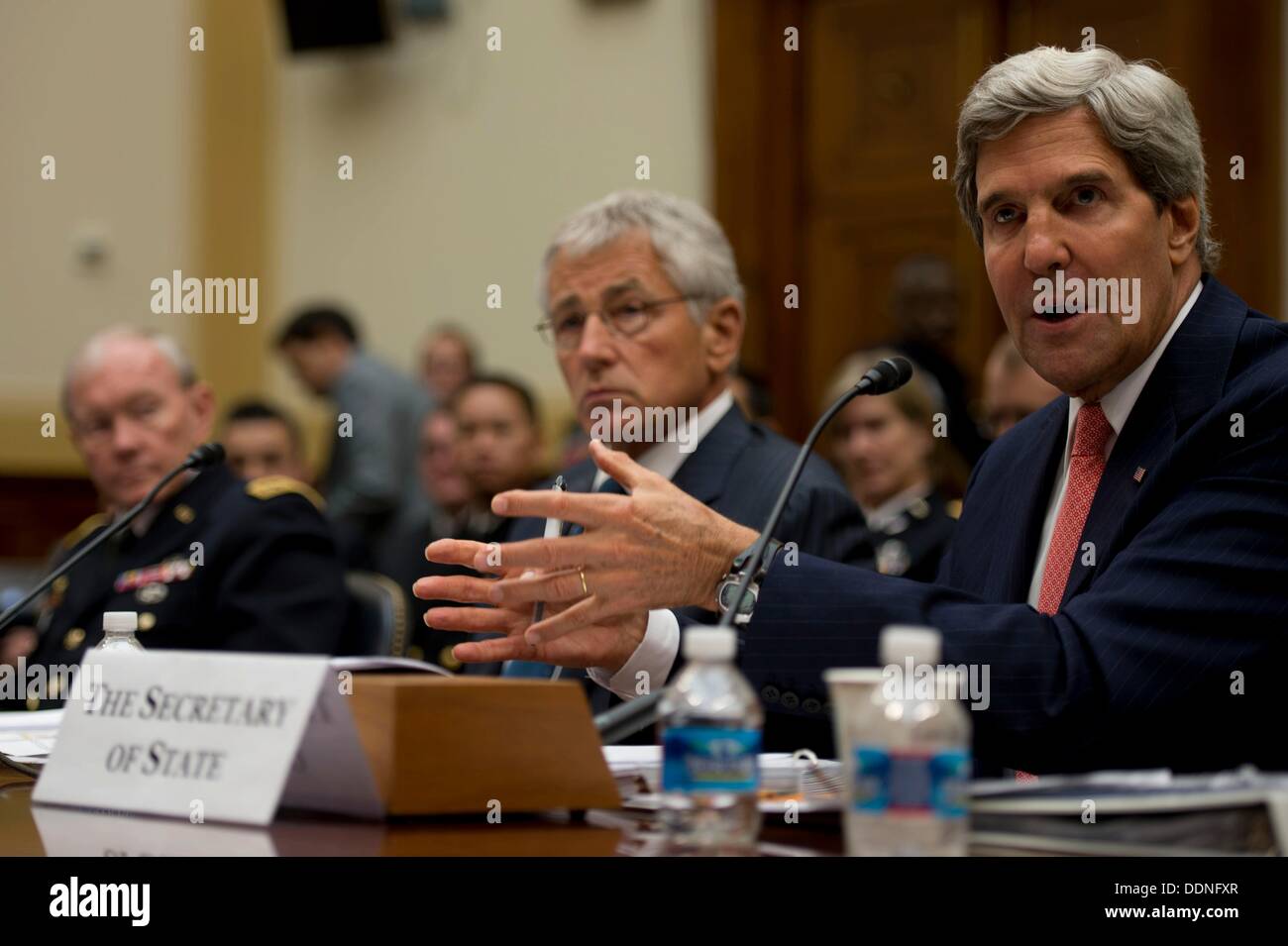 US Secretary of State John Kerry during a hearing on Syria before the House Foreign Affairs Committee September 4, 2013 in Washington DC. During the hearing, Kerry, Hagel and Chairman of the Joint Chiefs Gen. Martin Dempsey discussed possible military intervention in response to the use of chemical weapons by Syria on their own people. Stock Photo