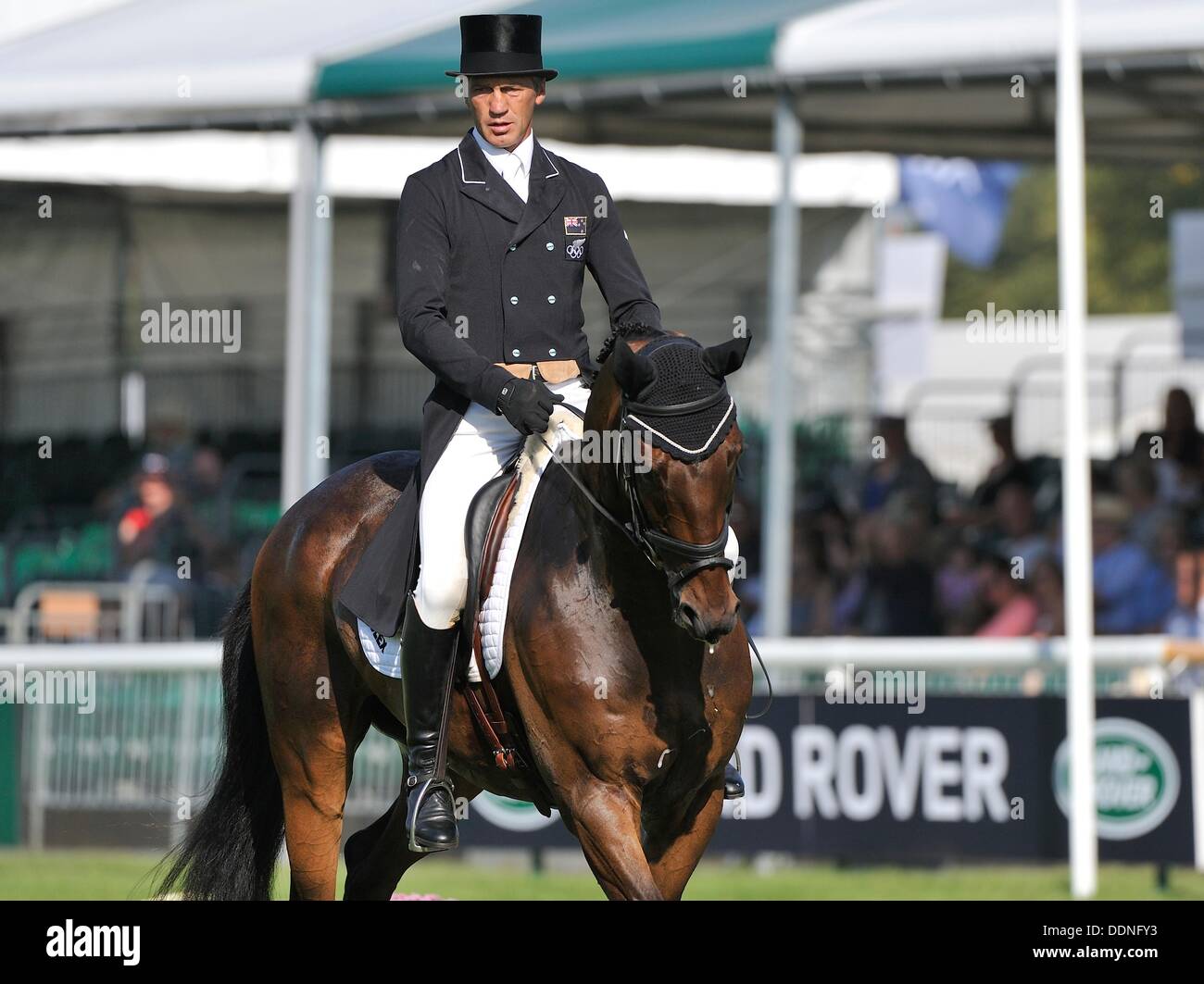 Stamford, England . 05th Sep, 2013.  Andrew Nicholson [NZL] riding CALICO JOE during the dressage phase on day 1 of The Land Rover Burghley Horse Trials.  The Land Rover Burghley Horse Trials take place between 5th - 8th September at Burghley House,© Stephen Bartholomew/Alamy Live News Credit:  Stephen Bartholomew/Alamy Live News Stock Photo