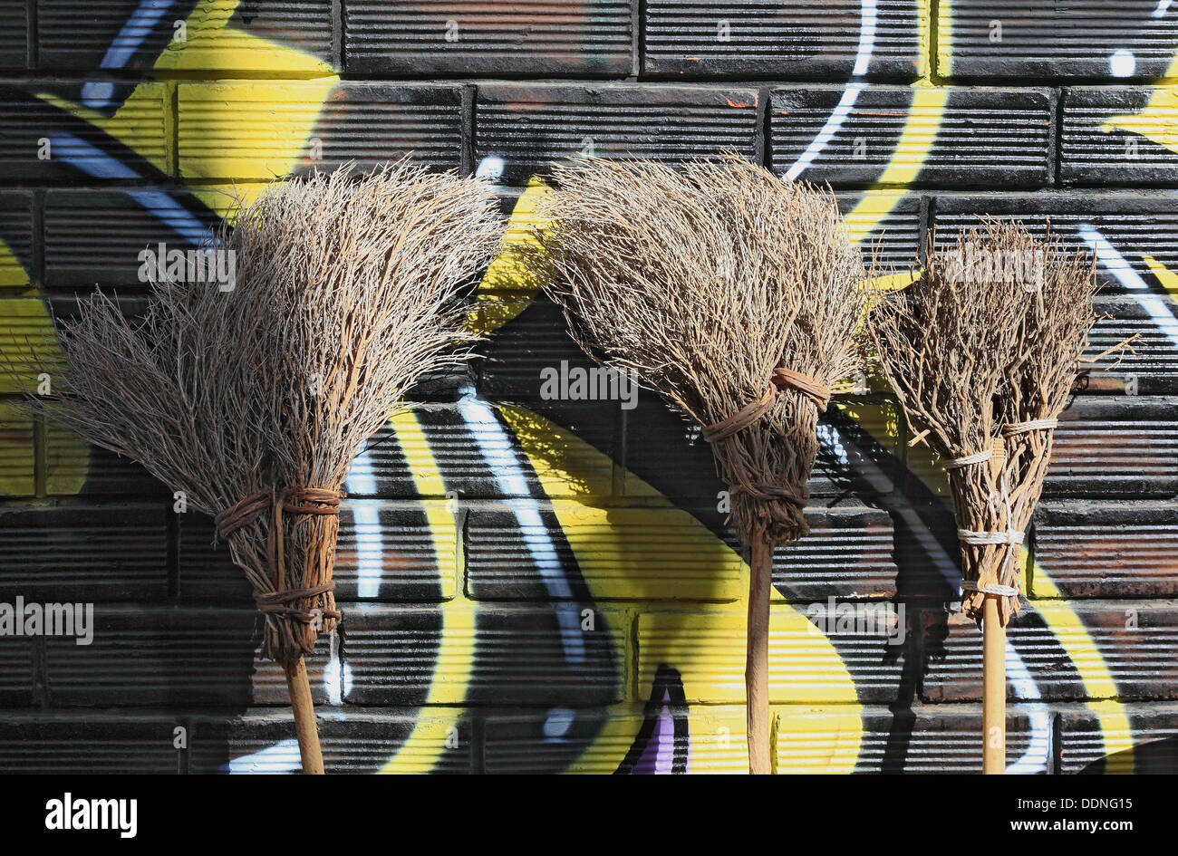 Three Broomsticks, handicrafts, straw broom, broom Stock Photo