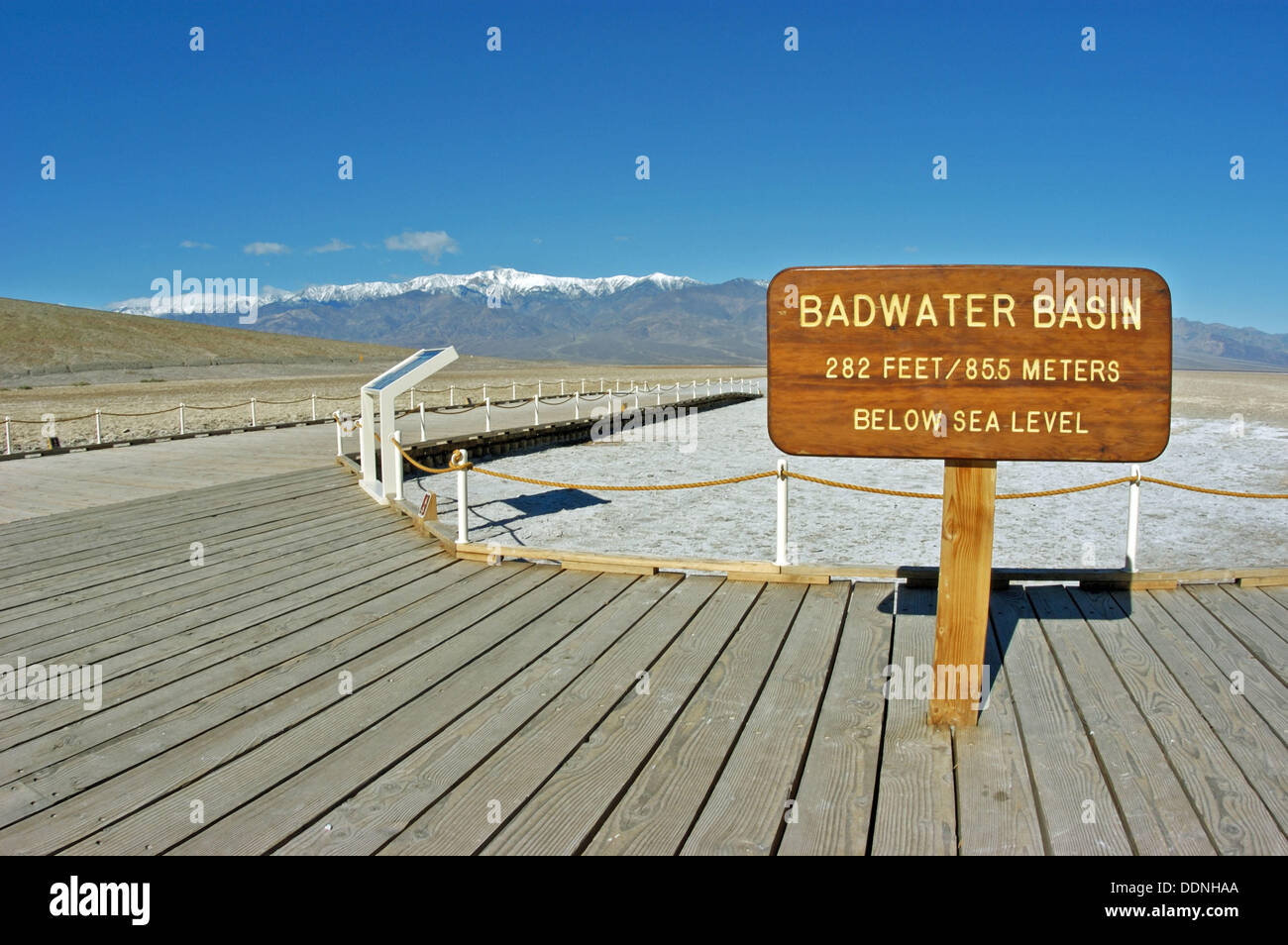 Interpretative sign on the boardwalk at Badwater (lowest point in the US) under Telescope Peak, Death Valley National Park, Stock Photo