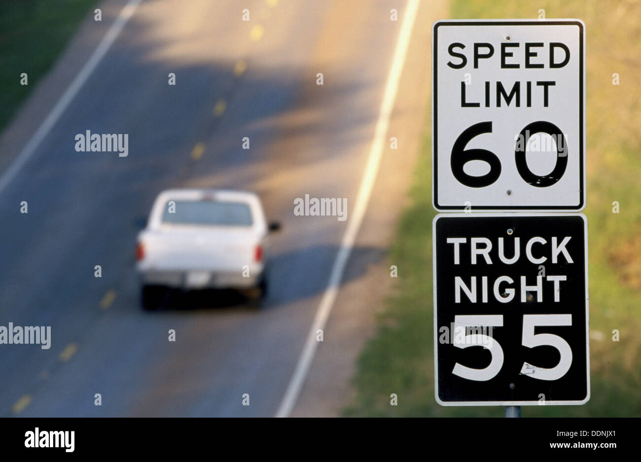 Speed limit signs and truck Stock Photo - Alamy
