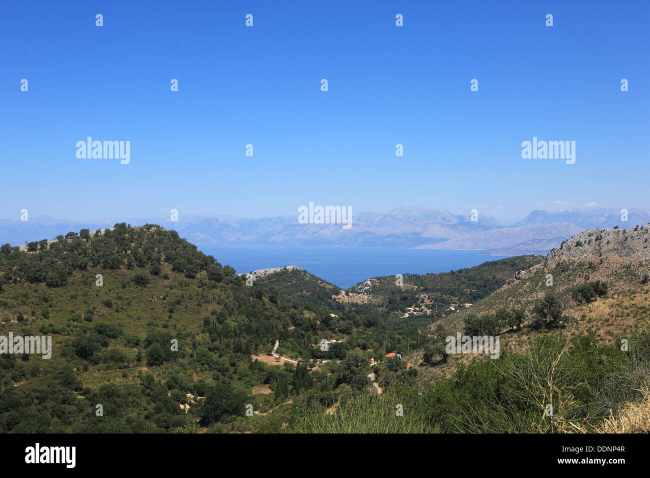 View from the slopes of Mount Pantokrator over the north coast towards Albania Stock Photo