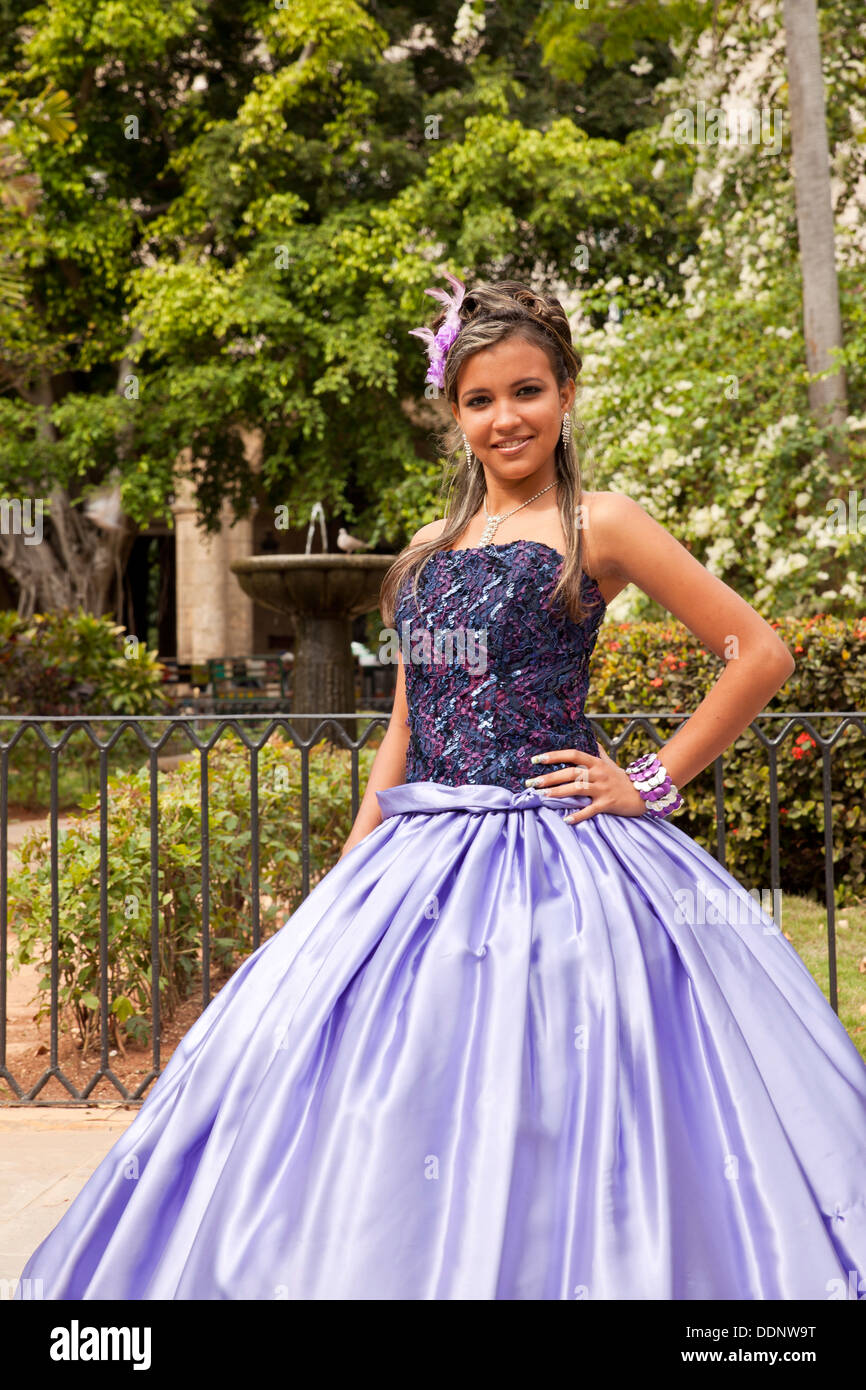 young girl dressed for the Quinceanera or Quince, the celebration of a girl's fifteenth birthday in Havana, Cuba, Caribbean Stock Photo