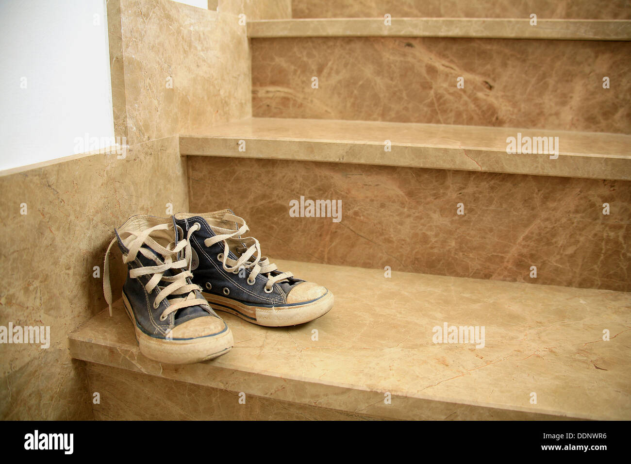 Sneakers on stairs Stock Photo Alamy