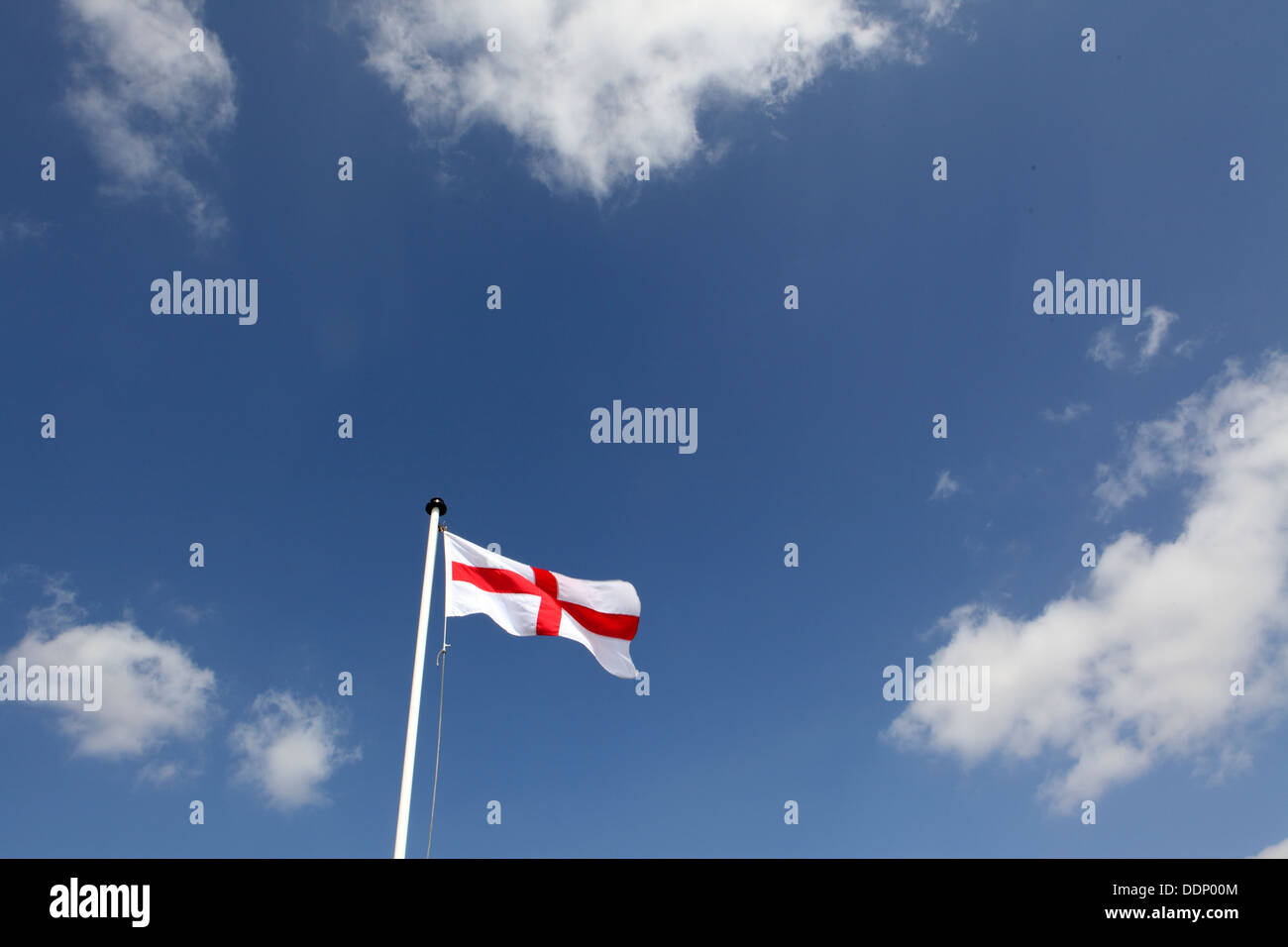 Flag flying to commemorate, St Georges Day, Suffolk, UK Stock Photo