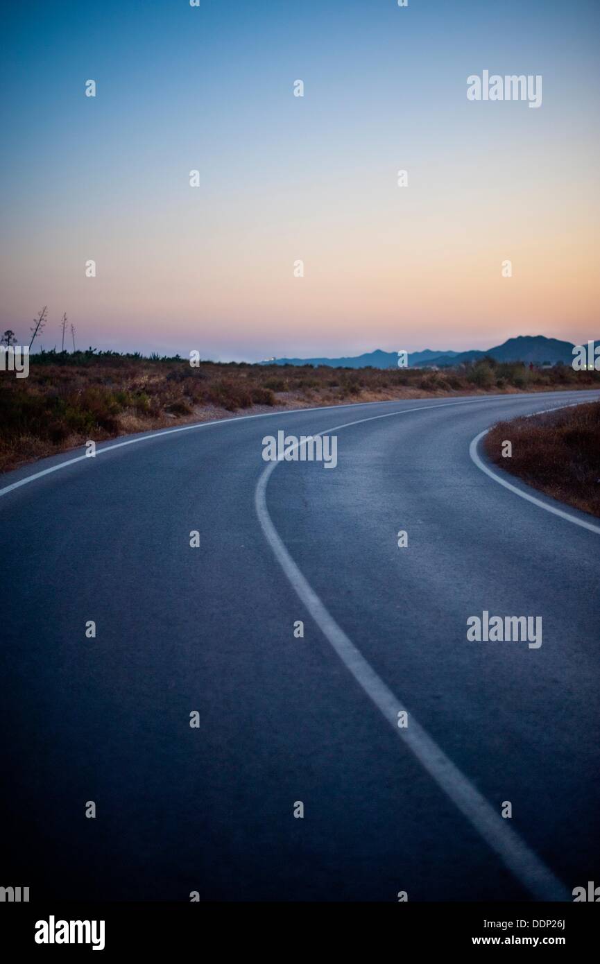 road, sunset, traffic, white line, asphalt, turning, Spain Stock Photo