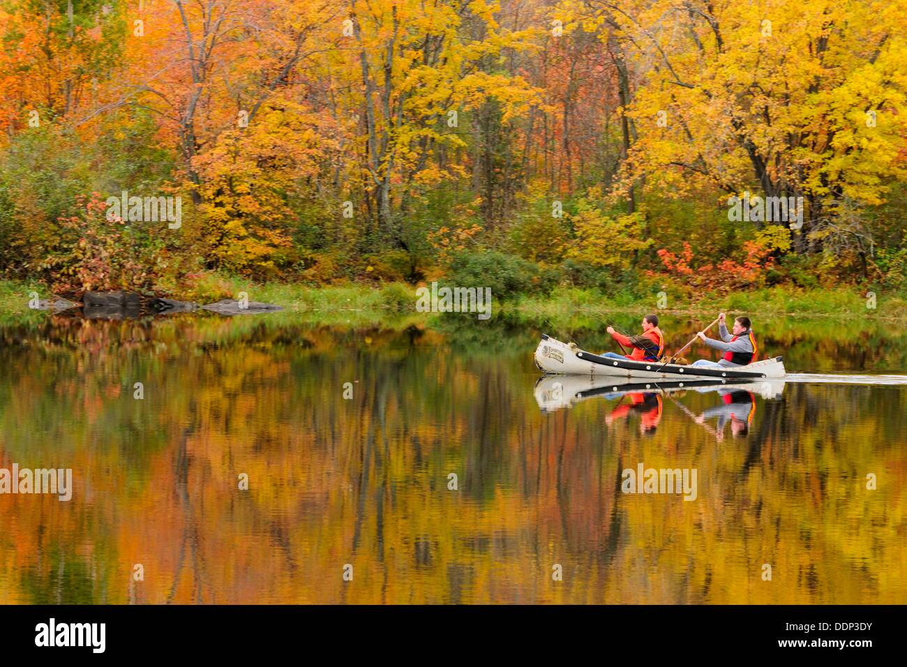 Two fisherman paddling canoe on Vermilion River Stock Photo Alamy