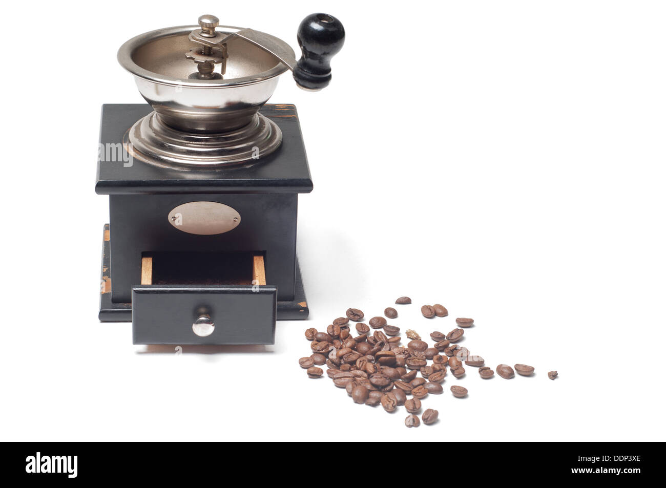 Oldfashioned manual burrmill coffee grinder on white Stock Photo Alamy
