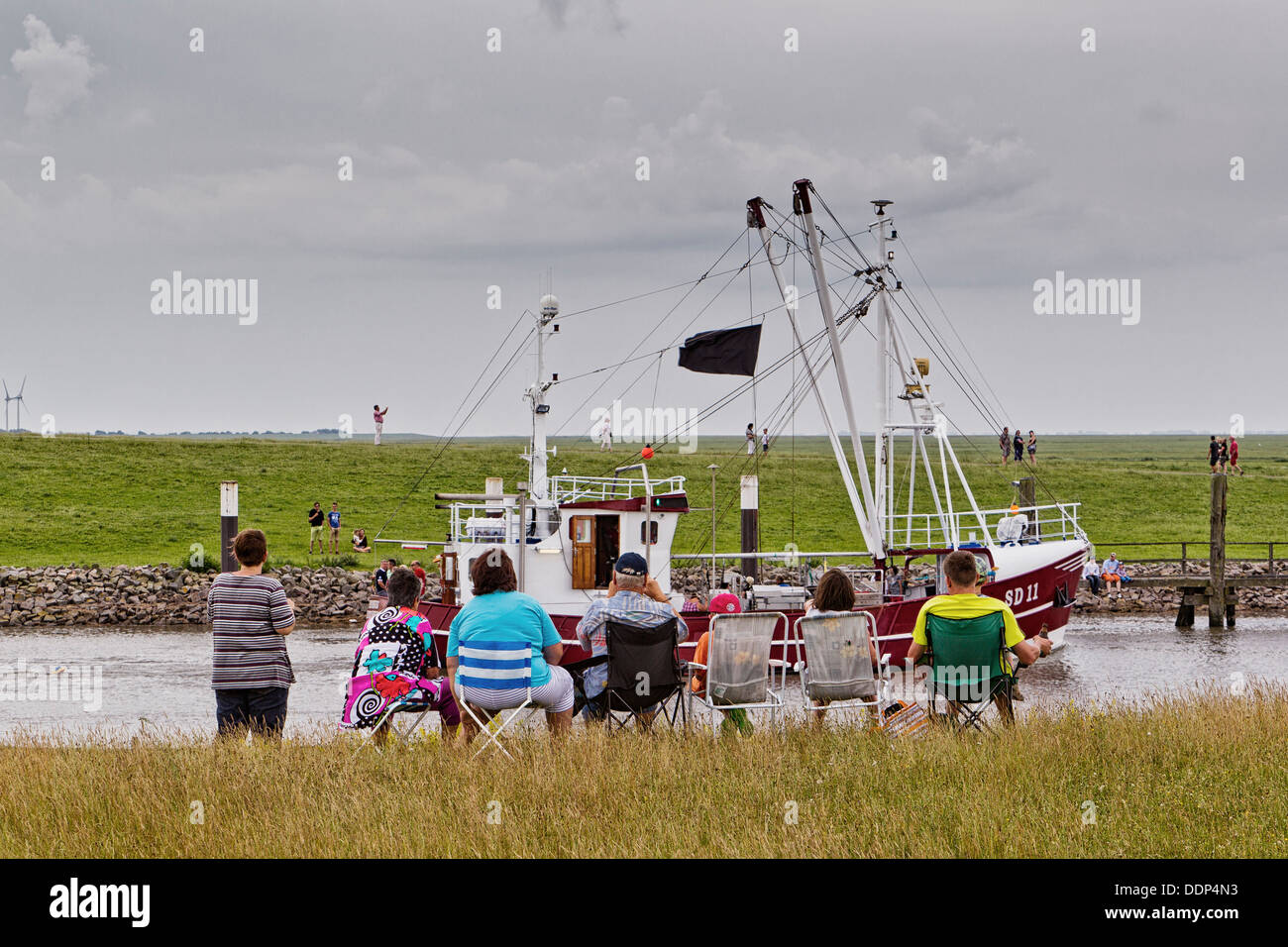 Tourists at regatta of fishing boats, Friedrichskoog, Schleswig-Holstein, Germany, Europe Stock Photo