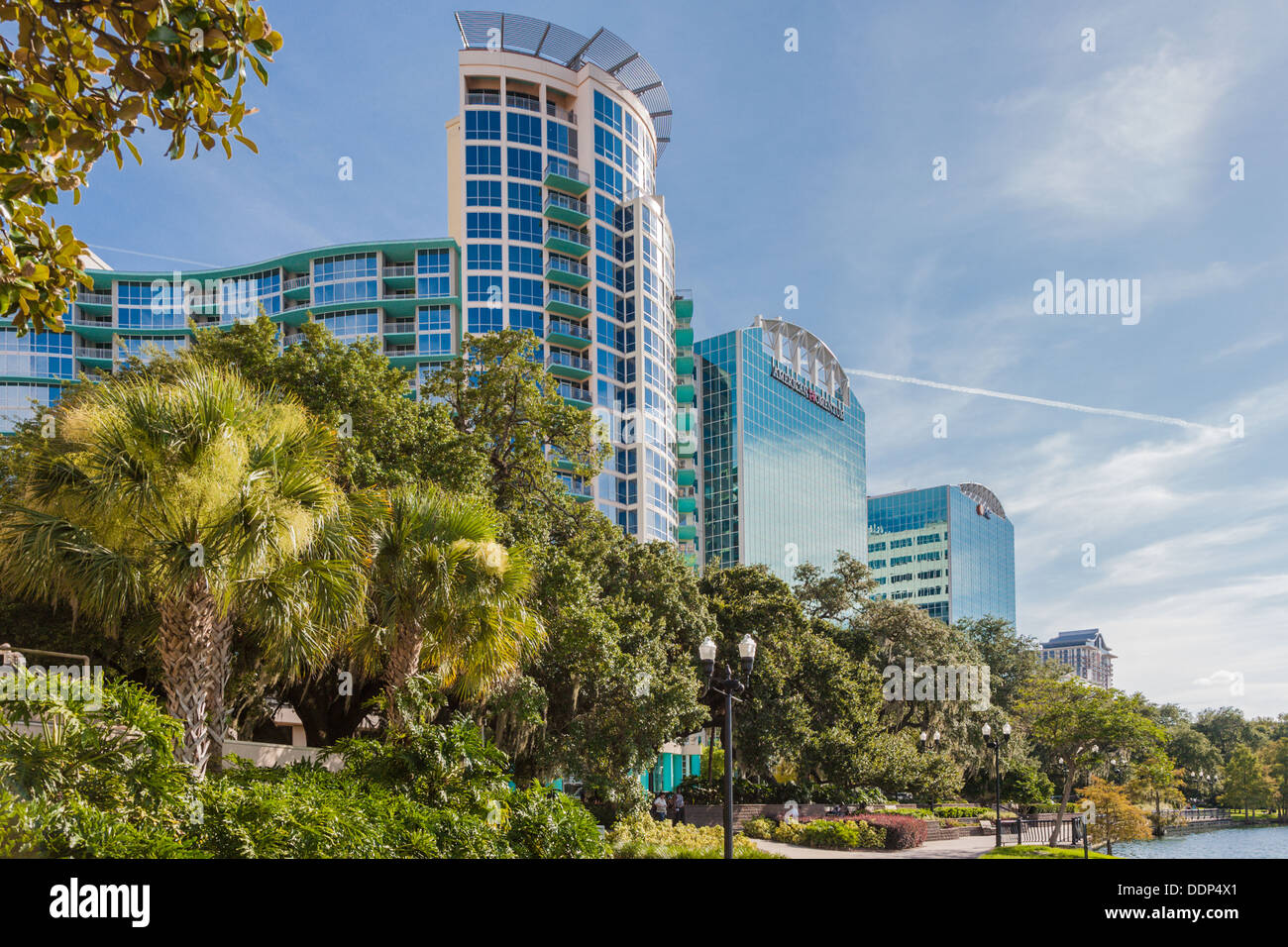 High rise buildings along the bank of Lake Eola in downtown Orlando Florida Stock Photo
