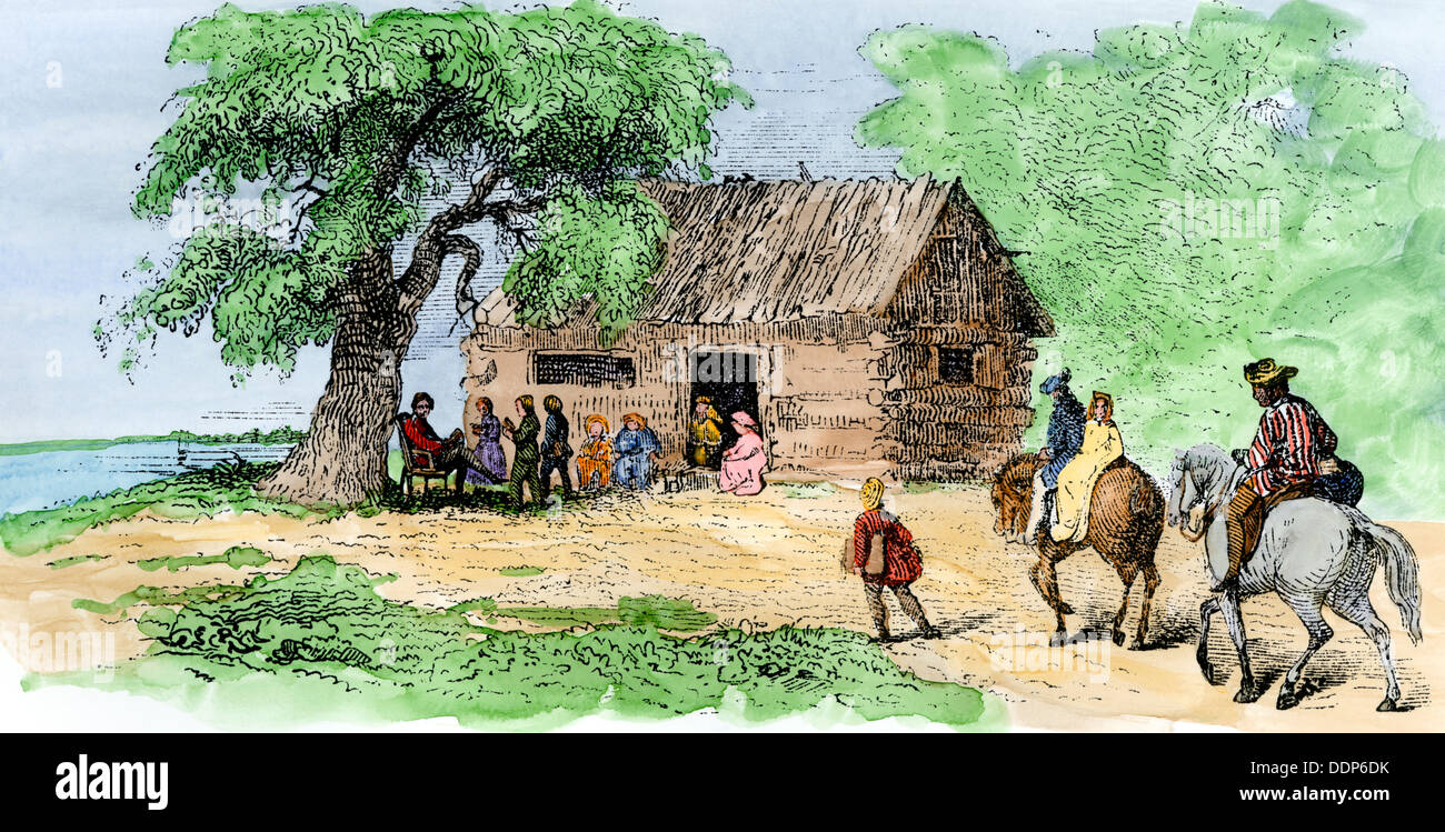 Children coming to a one-room log schoolhouse in the US South. Hand-colored woodcut Stock Photo