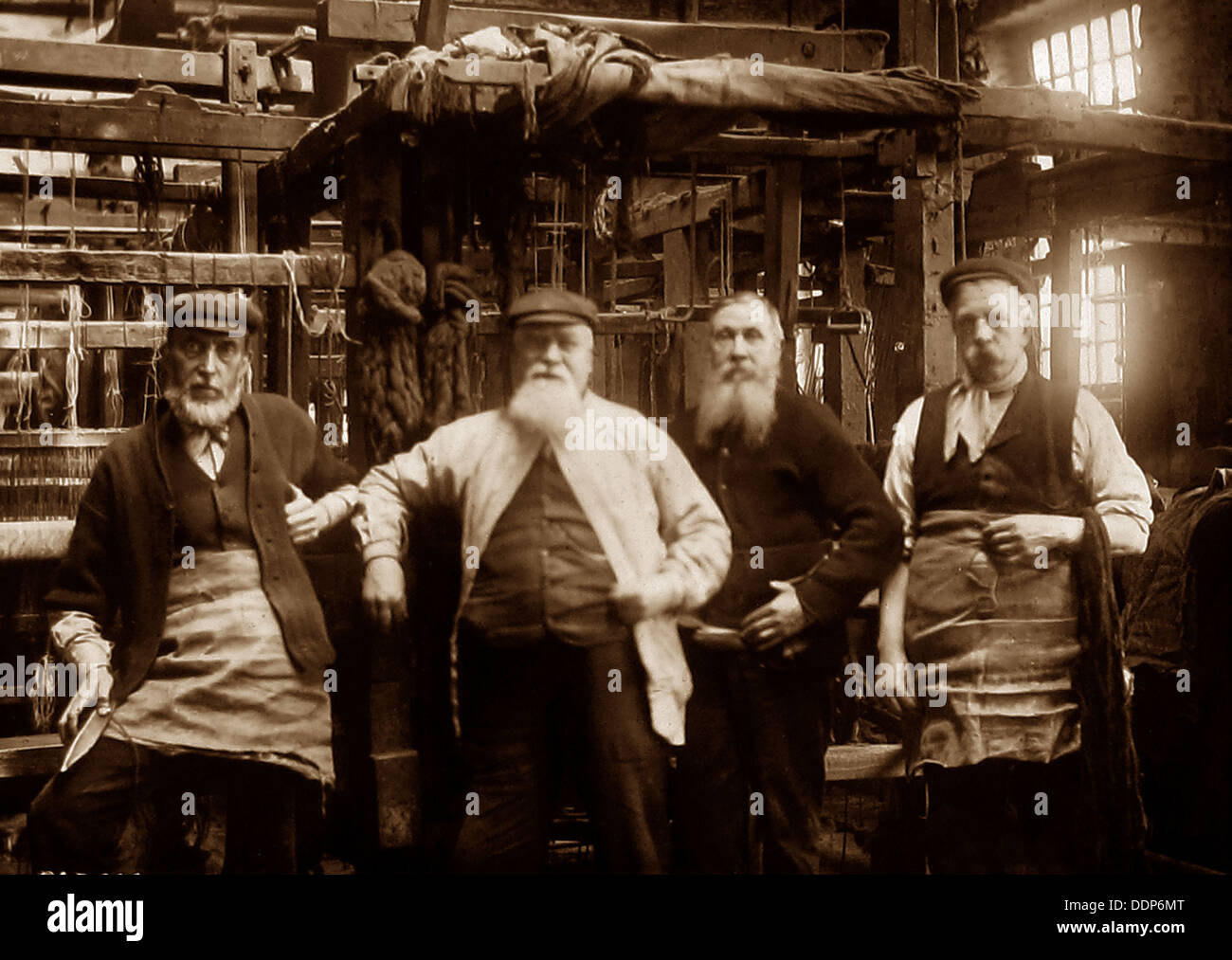 Hand loom weavers early 1900s Stock Photo - Alamy